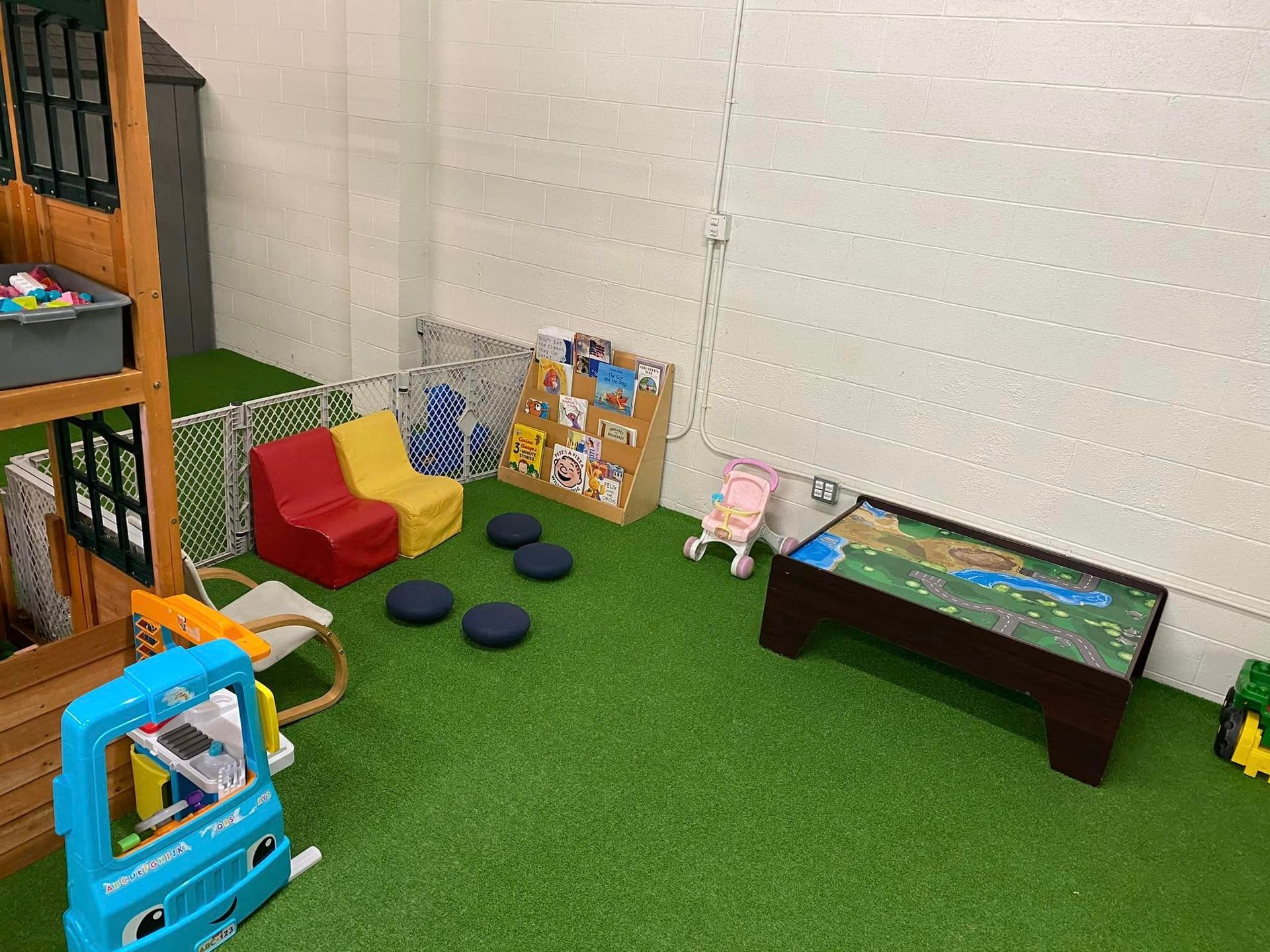 A Children 's Play Area with A Table, Chairs, and Toys – Oroville, CA – Aunt Sherrie's Preschool