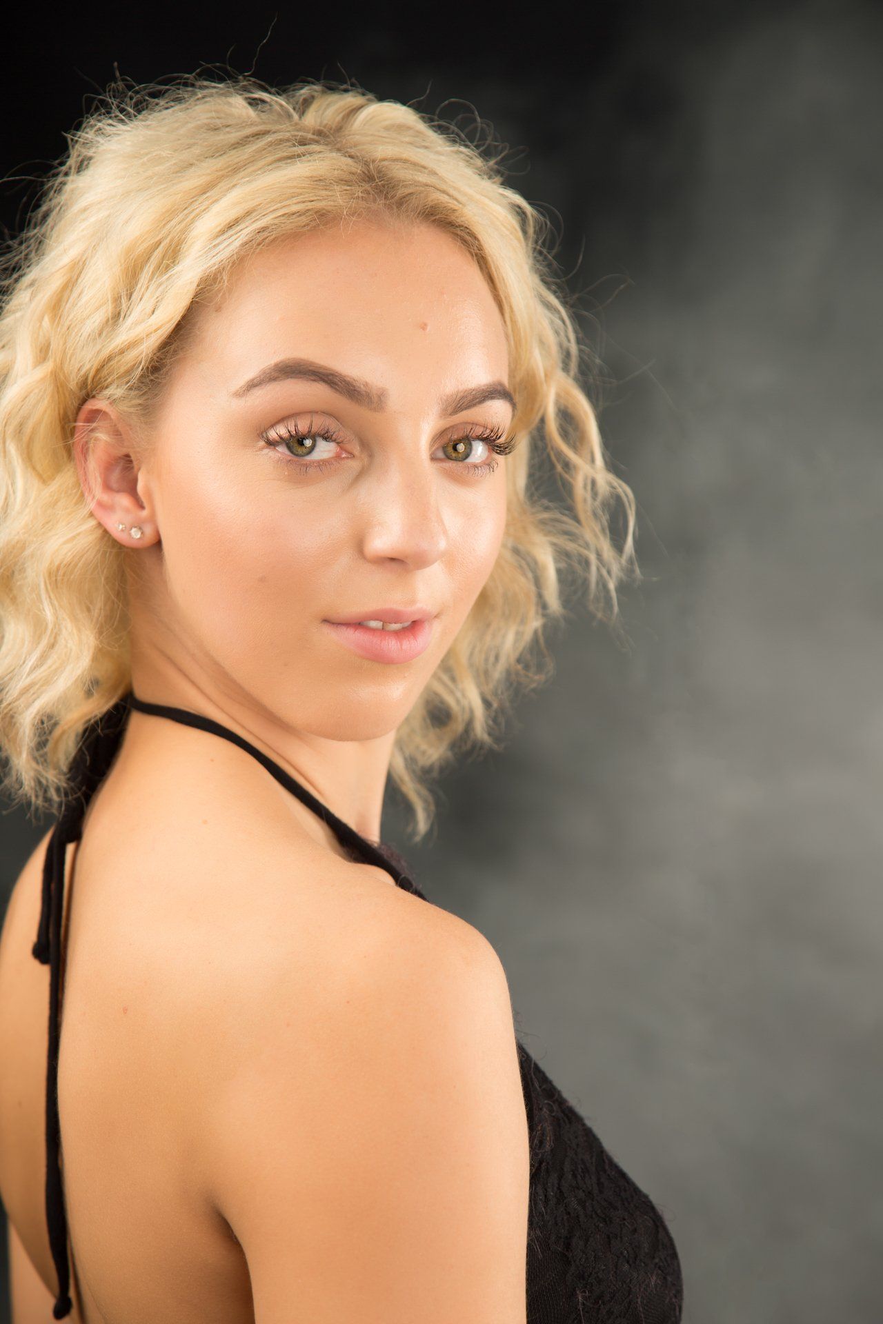 Dance photography in Leeds studio female looking over shoulder