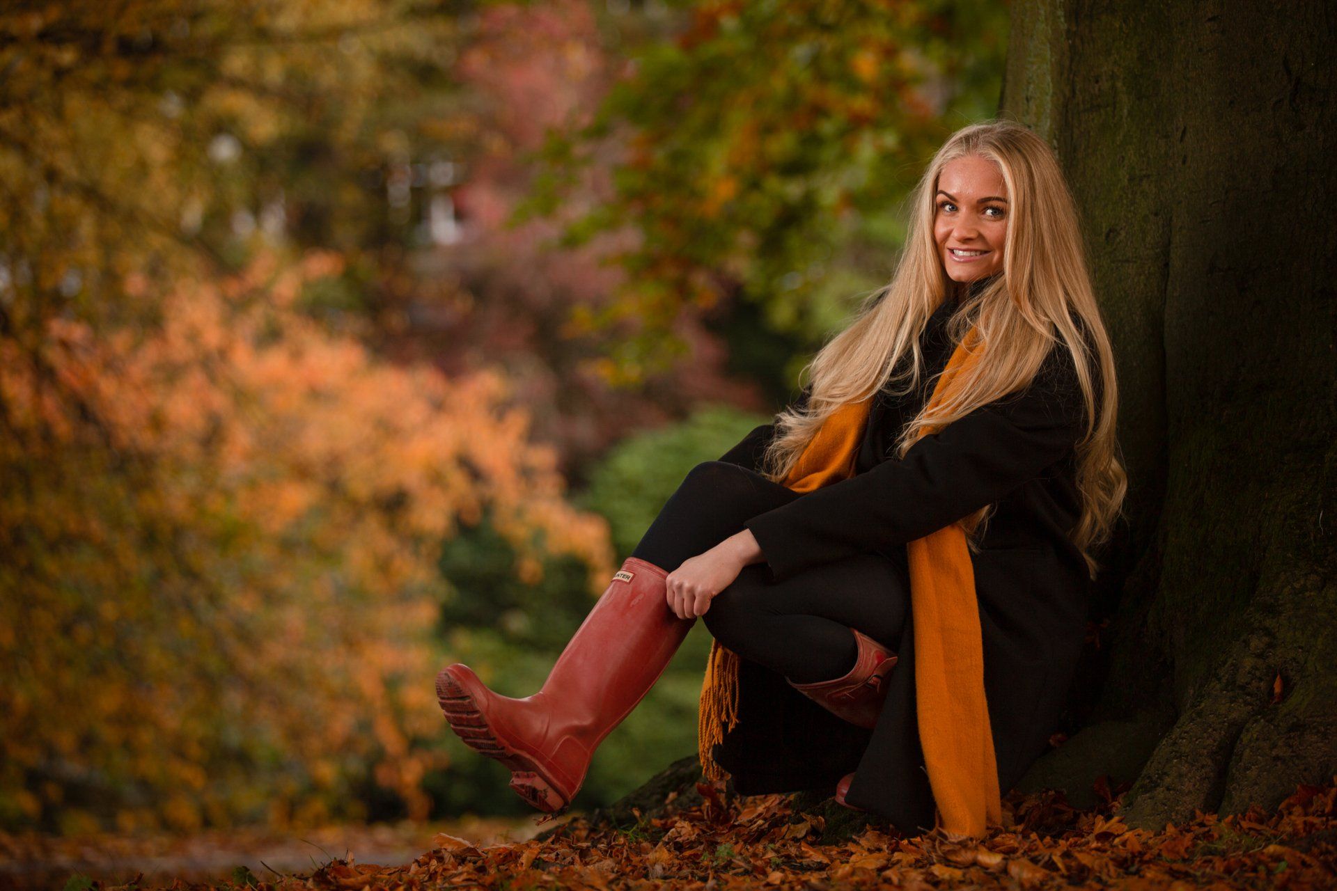 Beautiful Autumn portrait photography of young woman in Valley Park, Harrogate