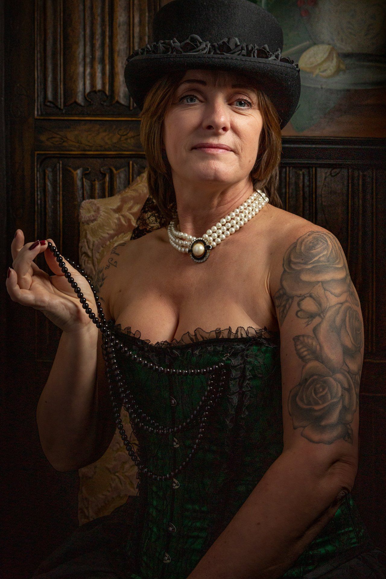 Beautifully lit portrait of gothic lady in Holdsworth House, Halifax