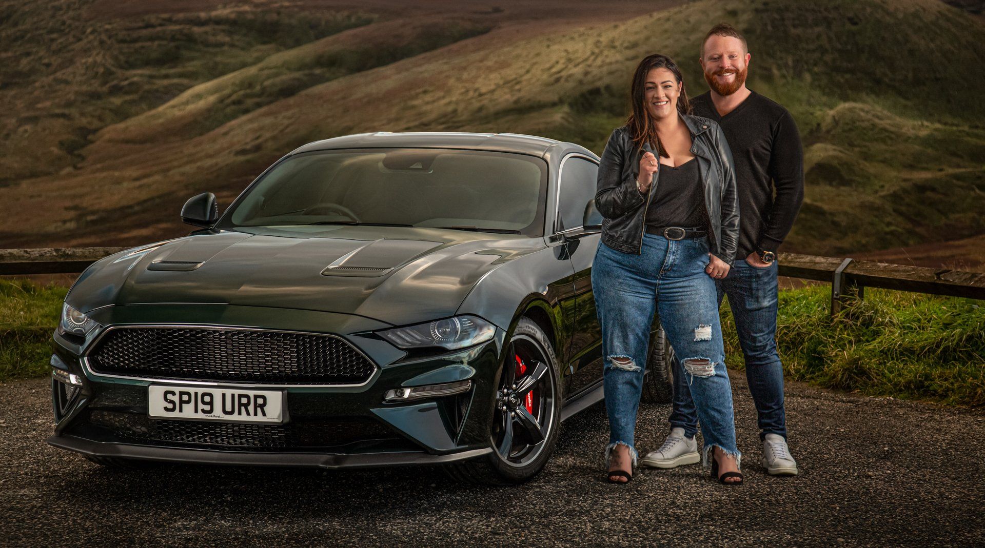 On location portrait photography of Couple beside Mustang Bullitt 2020 at sunset on Marston Moor, Huddersfield
