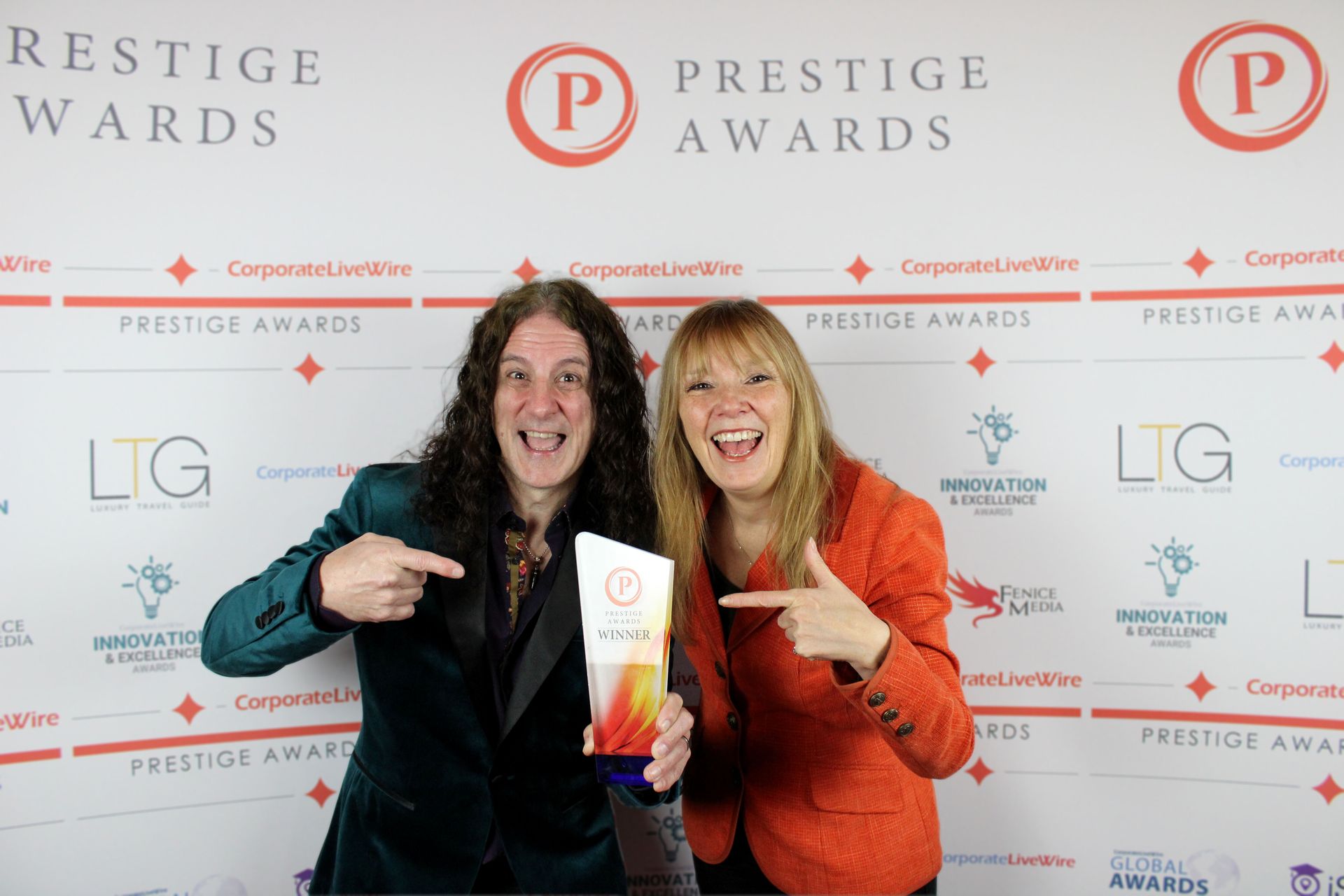 Lincoln and Perrin receiving their Prestige photographers of the year award.