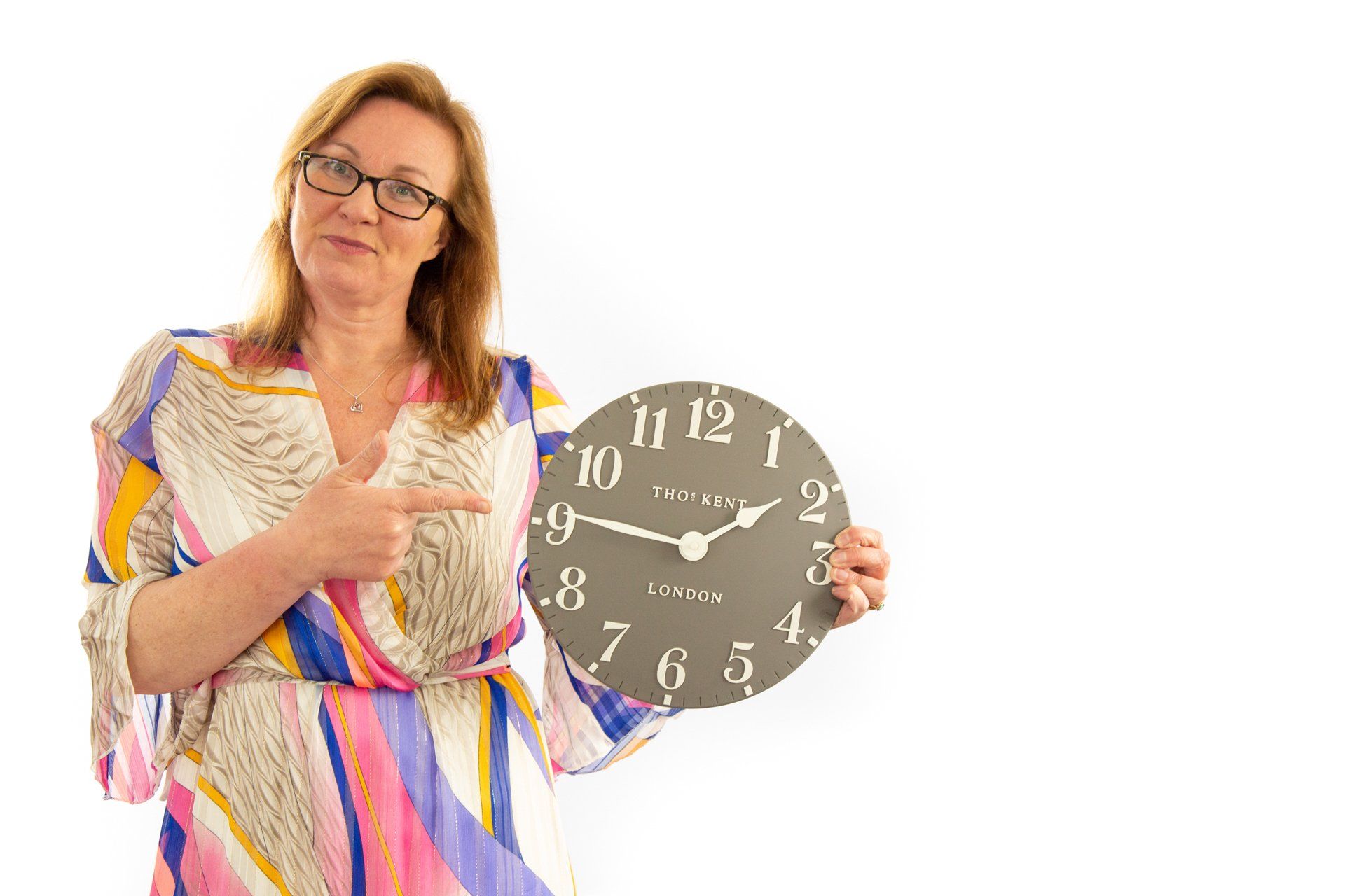 Emotipic of lady with clock captured in Roth Read Photography studio