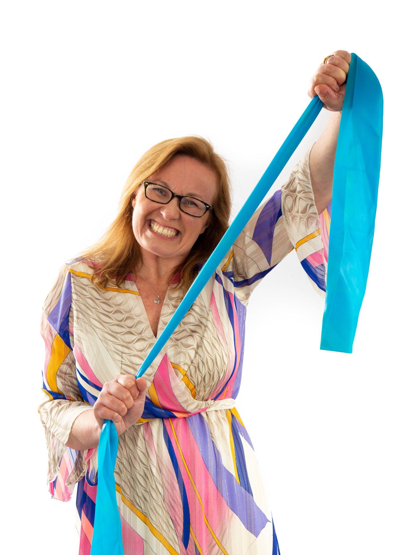 Emotipic of lady stretching a blue elastic band captured in Roth Read Photography studio