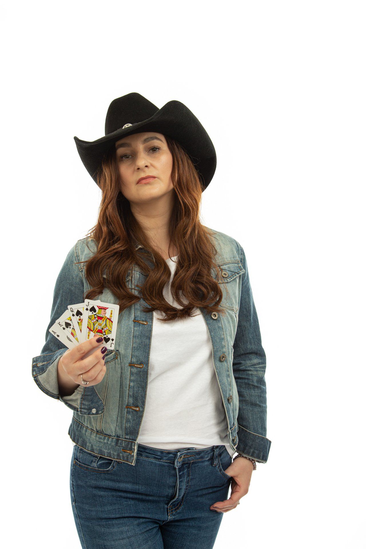 Emotipic of cowgirl gambler captured at Roth Read Photography Studio