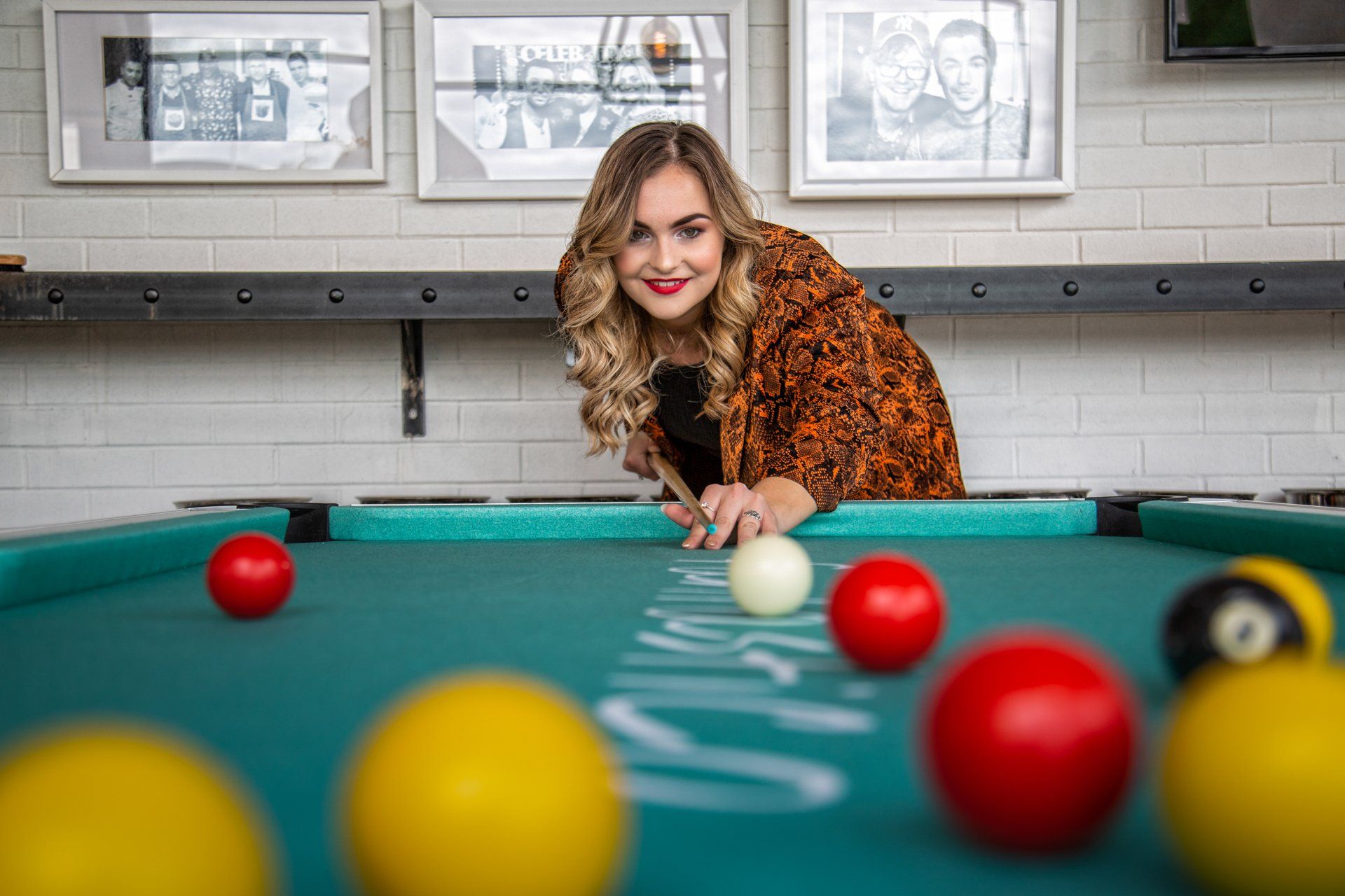Sales and Events Manager playing pool at Gino D'Acampo's Restaurant, Hull