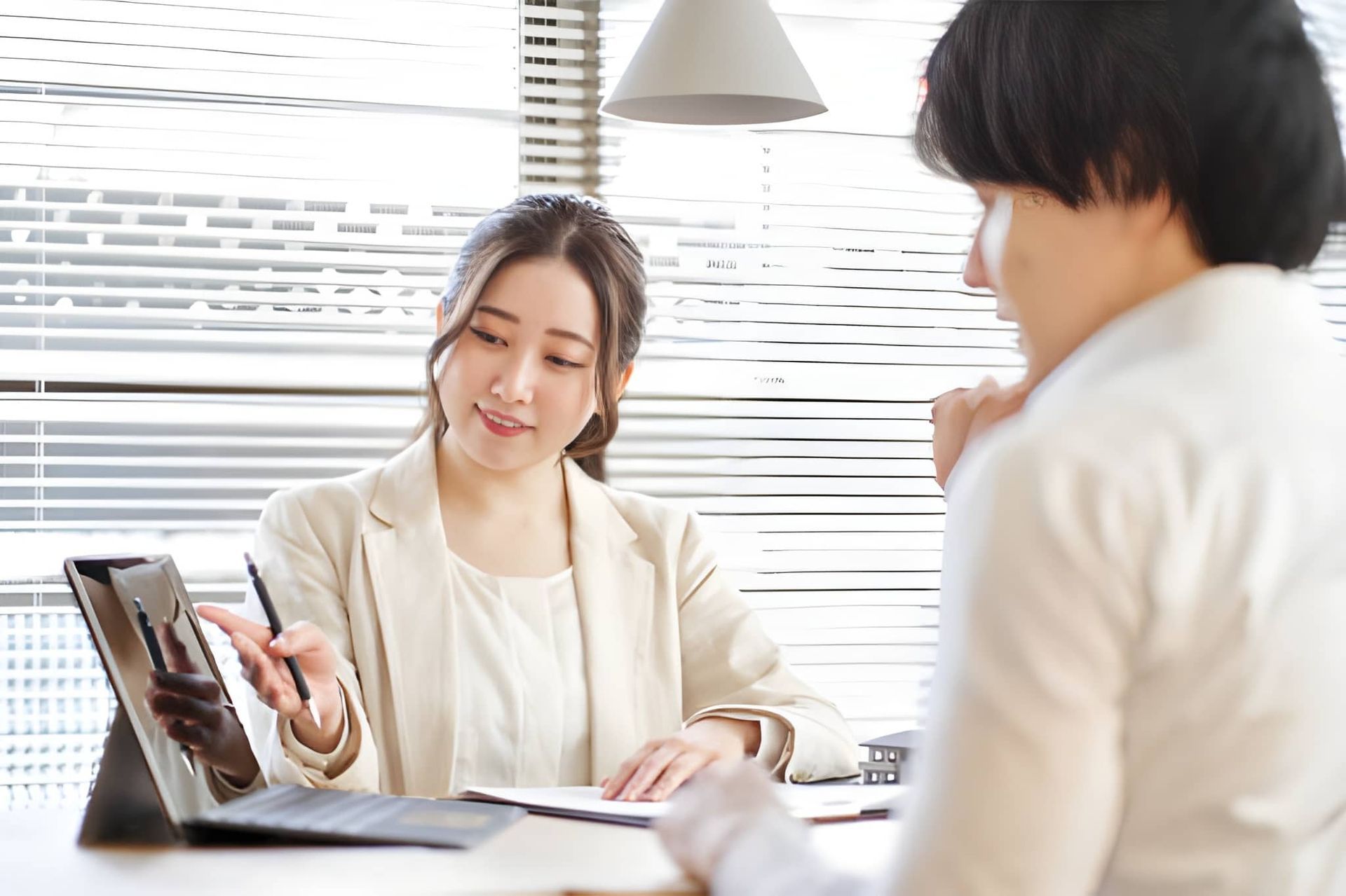 Home inspection Jupiter FL digital consultation with inspector explaining findings on tablet to client