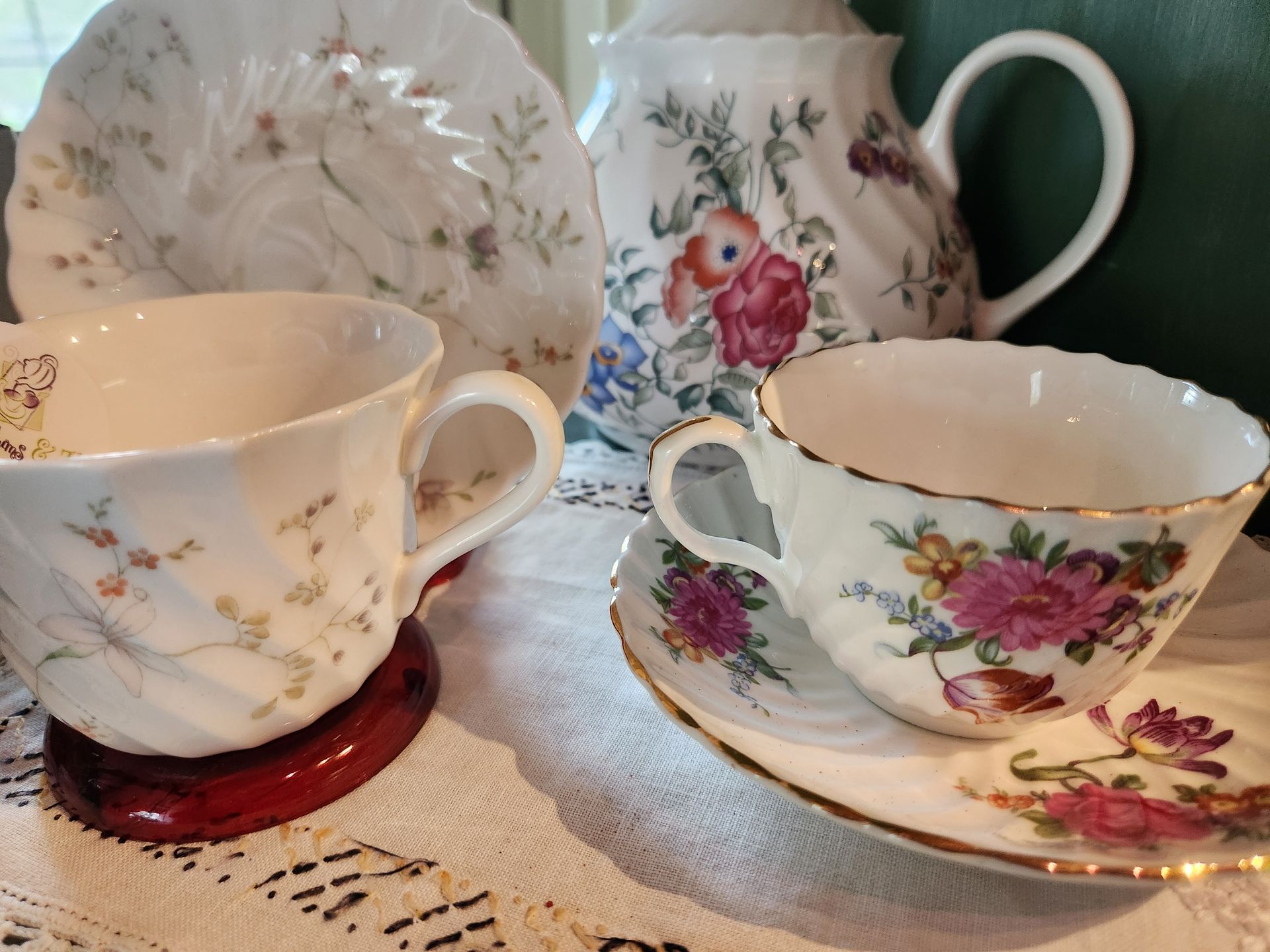 We have beautiful tea pots, tea cups and saucers.
