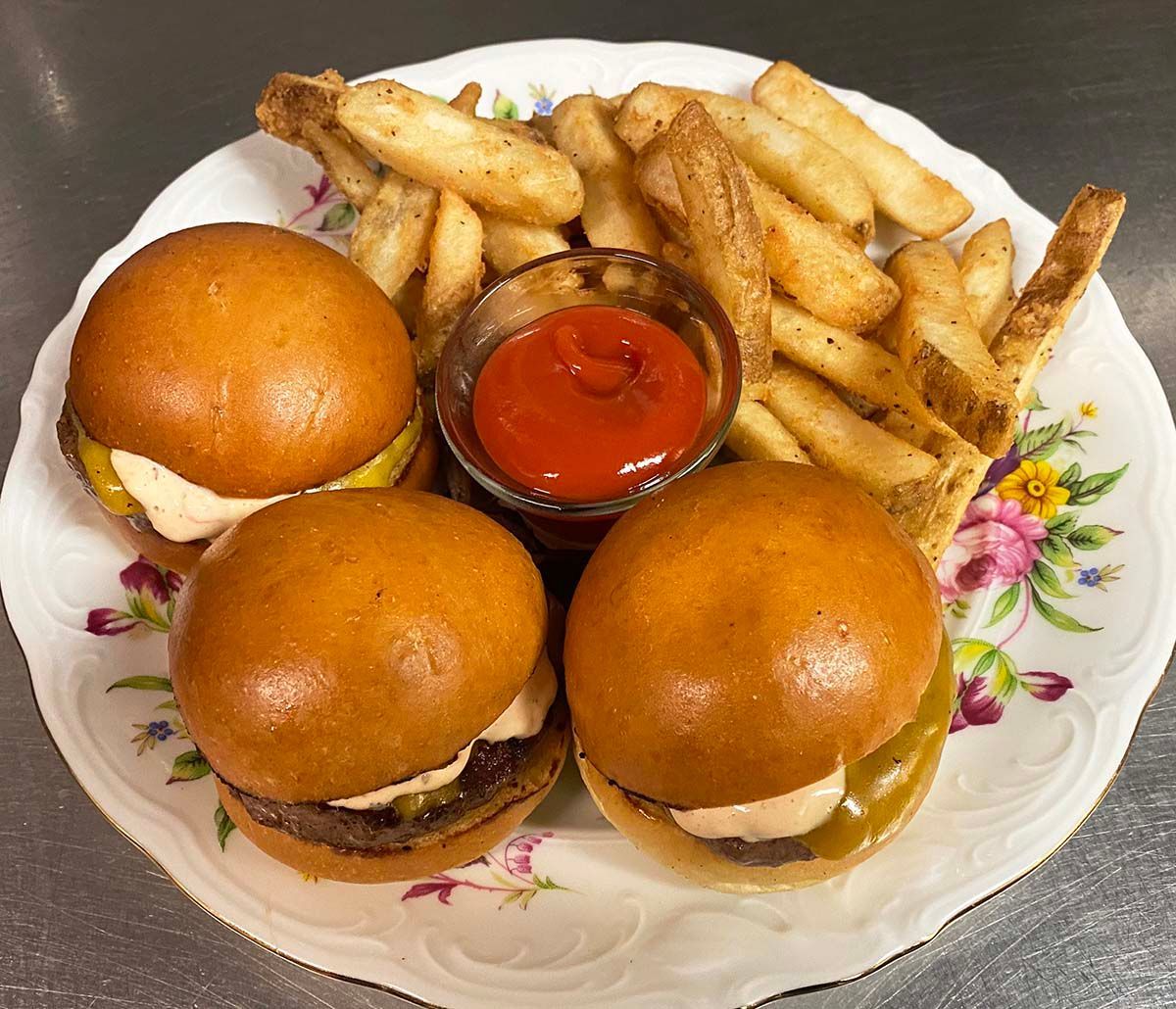 Cheeseburger Sandwiches and French Fries.