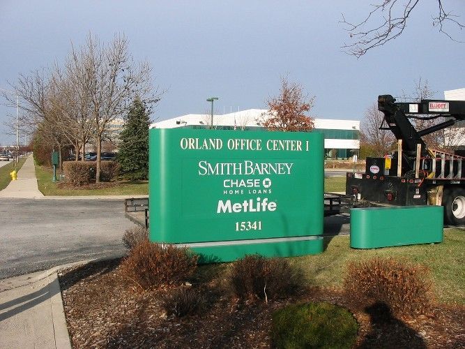 Sign for Orland Office Center 1 with tenant names, including Smith Barney, Chase, and MetLife.