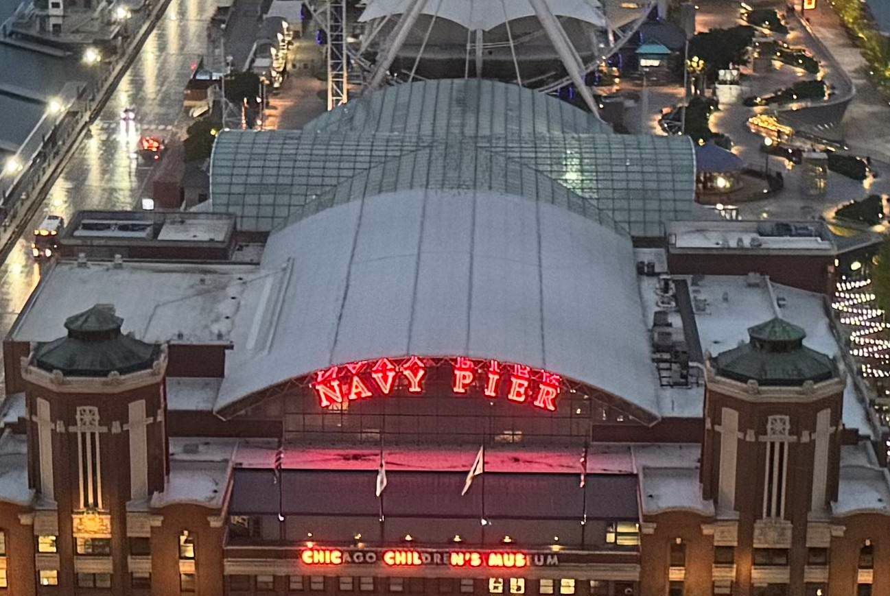 Navy Pier building at dusk with illuminated