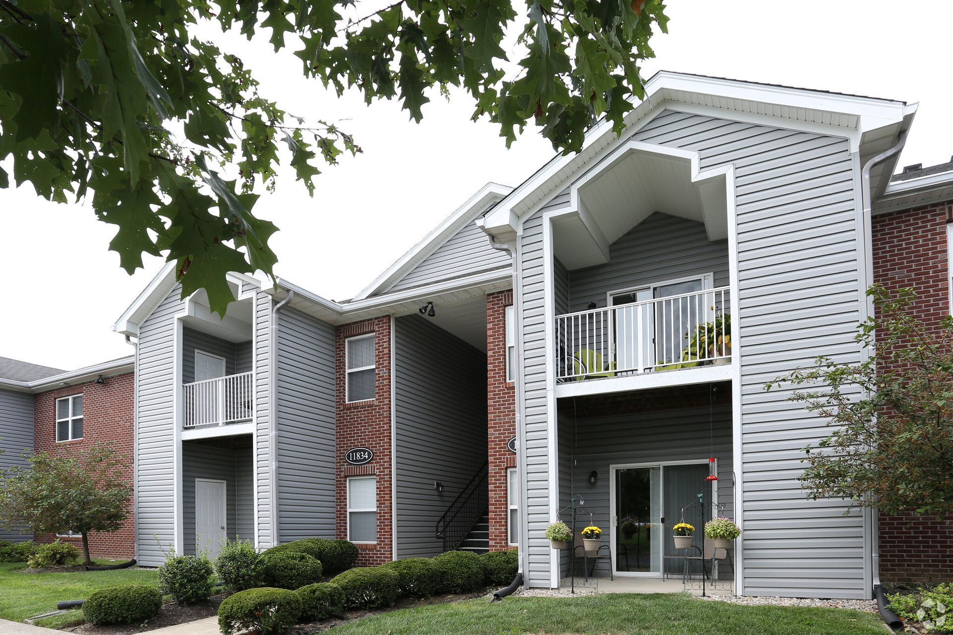 A large apartment building with a lot of windows and balconies