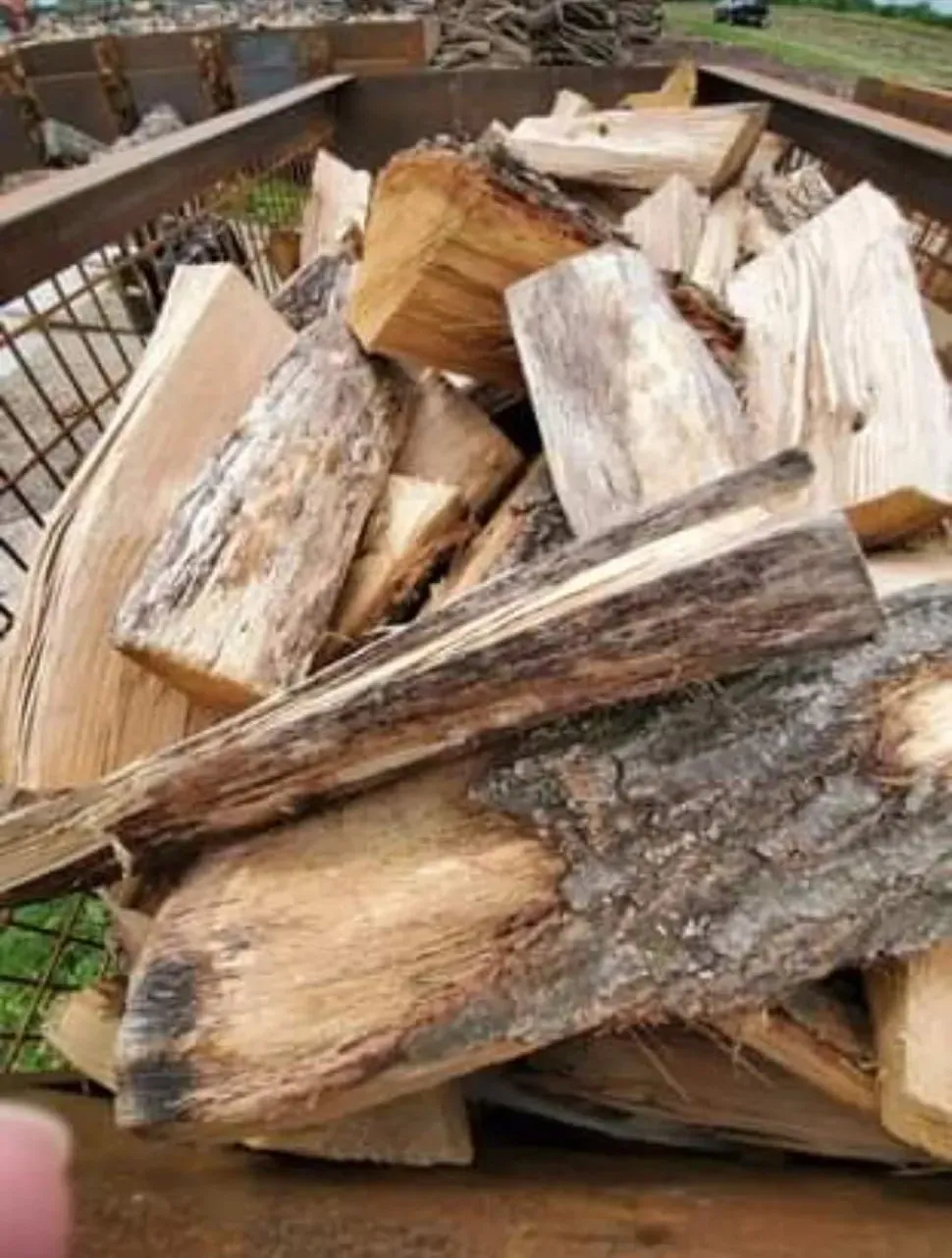 A Pile of Wood Is Sitting on Top of A Wooden Table - New London, WI - Mid State Firewood