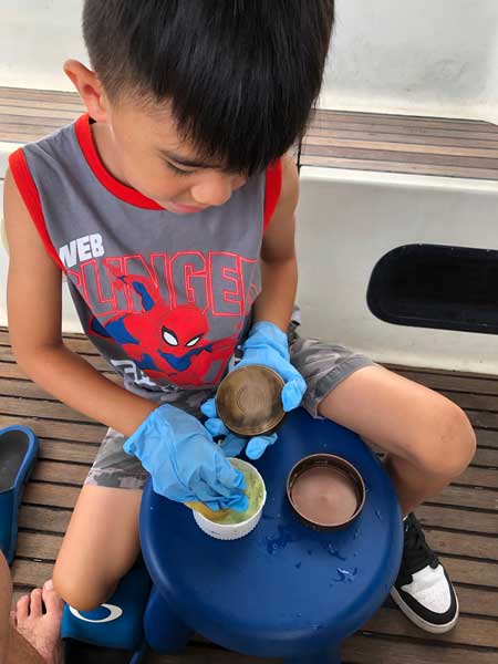 Eli cleaning the compass