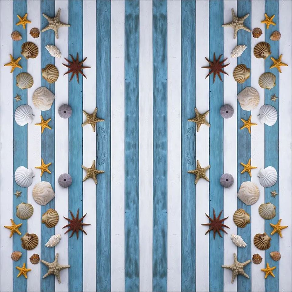 blue and white striped tablecloth with starfish and shells