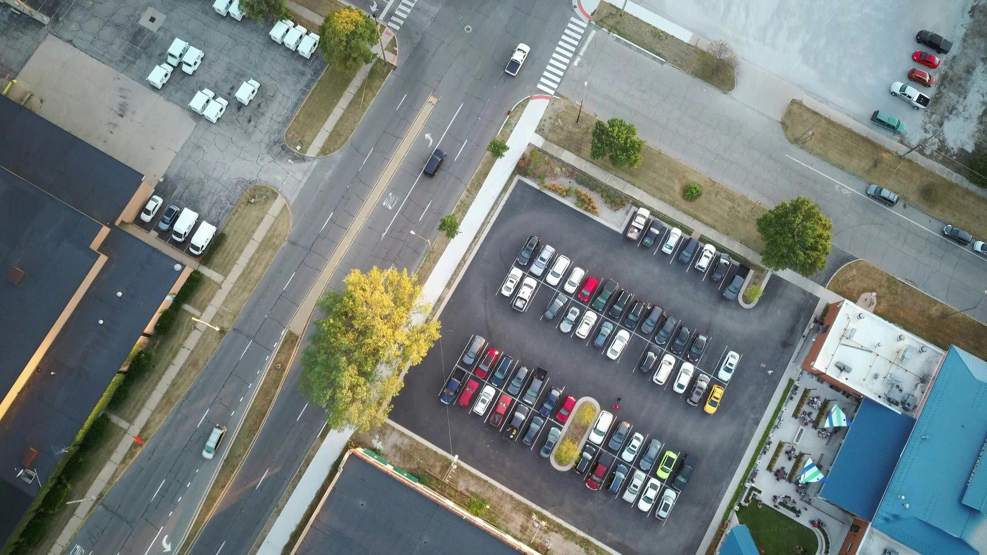 cars parked in a hot parking lot