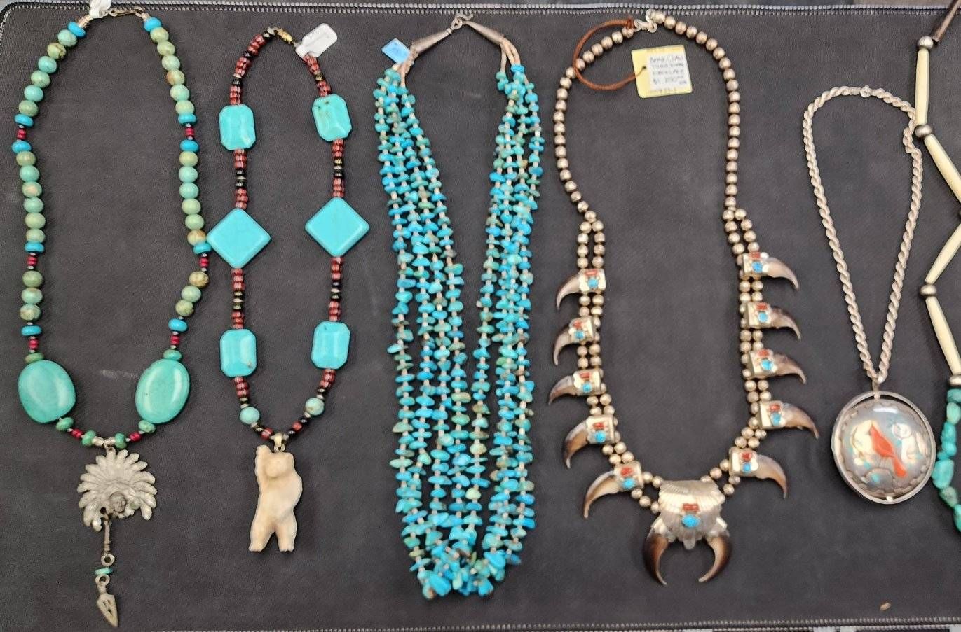 A collection of native american necklaces with turquoise beads