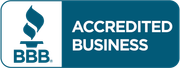 A blue sign that says accredited business on it