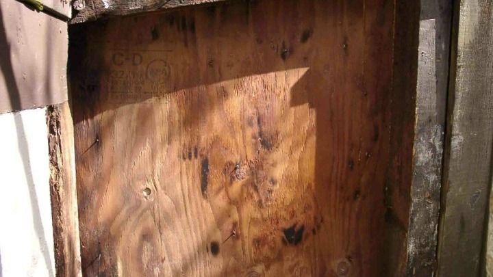 A close up of a piece of wood in a room.