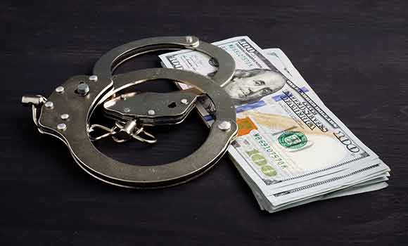 Handcuff And Money — Shelby, NC — Beaver Bail Bonds