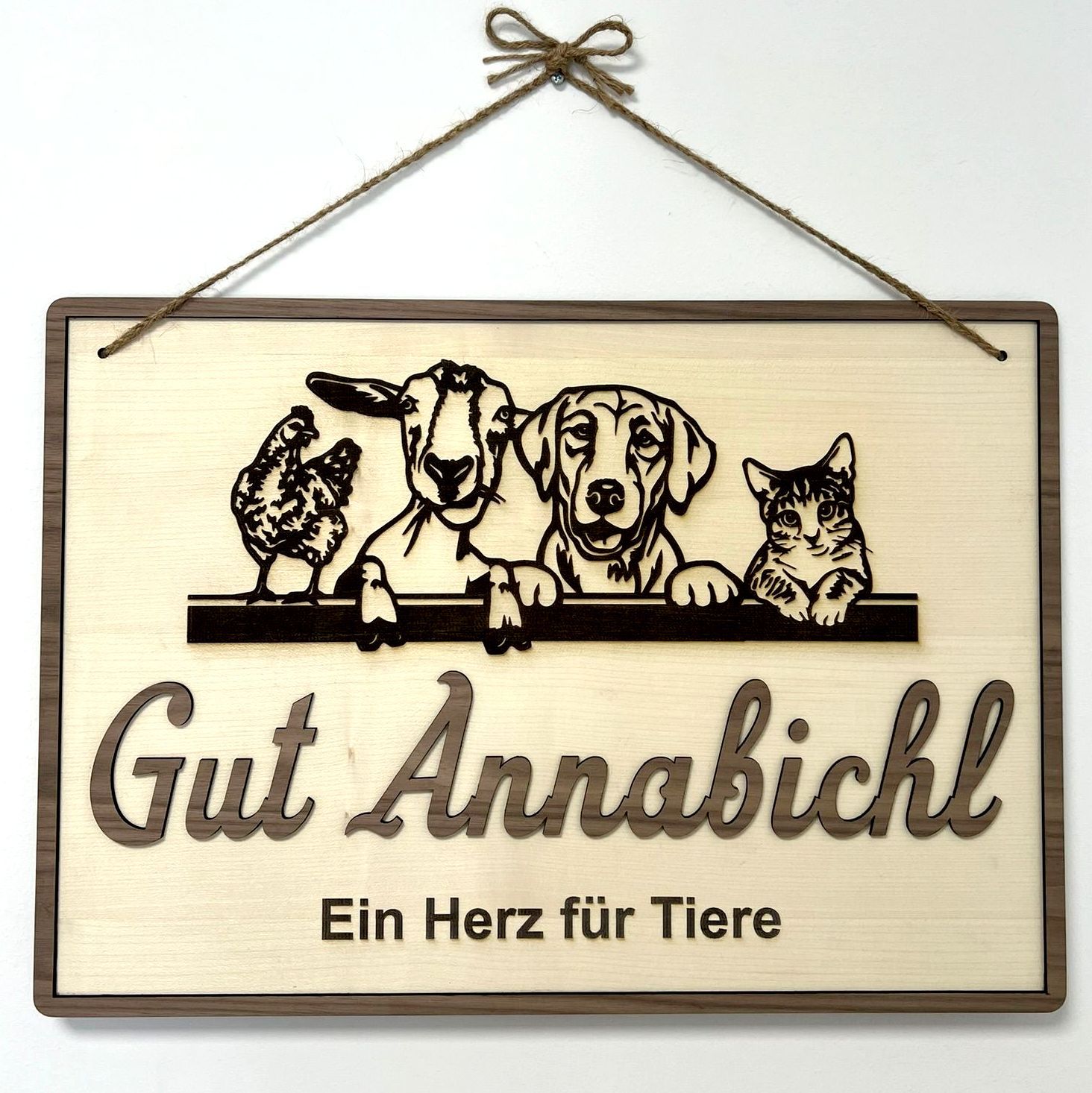 A sign that says gut annabichl ein herz fur tiere