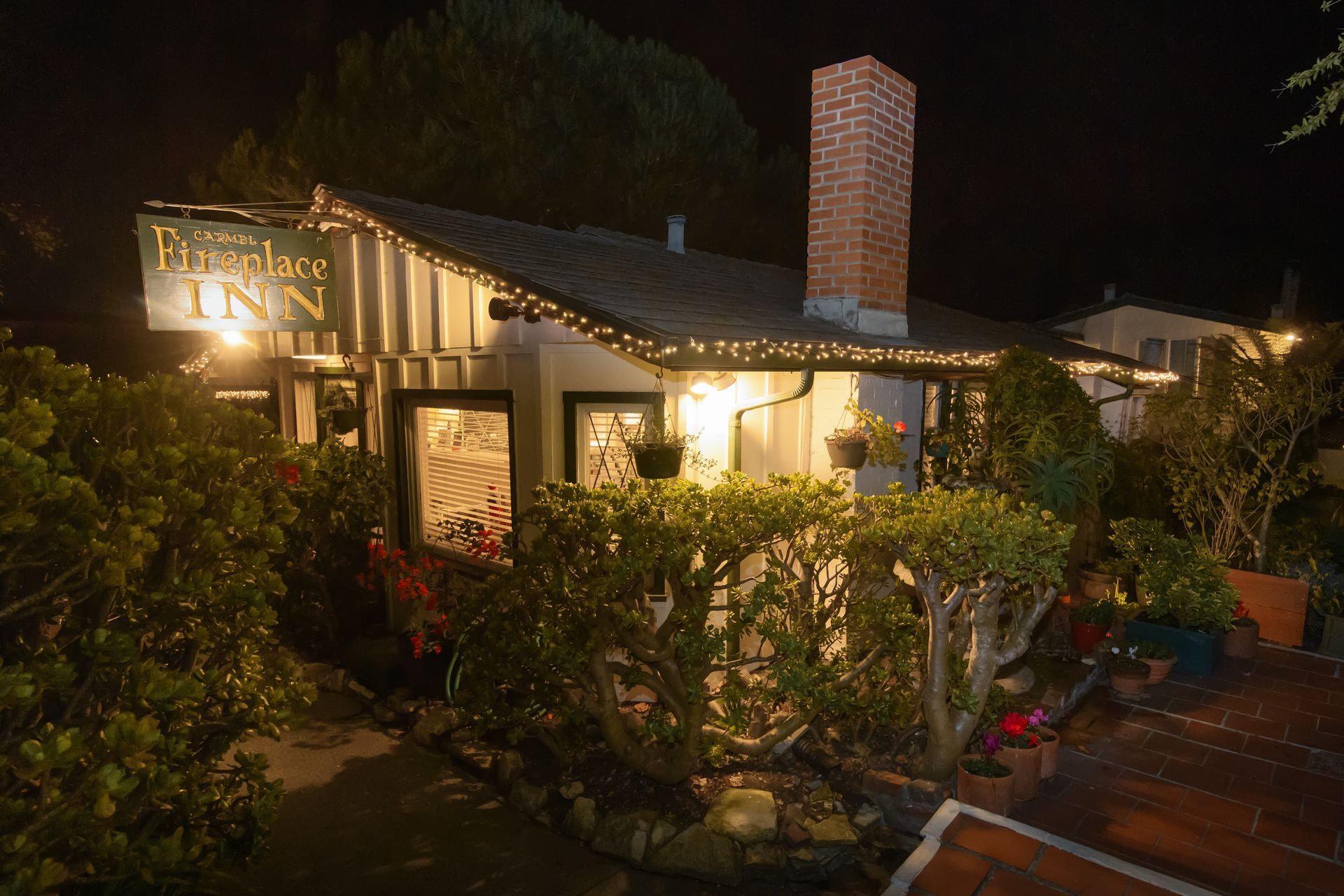 A house with a sign that says ritz place inn