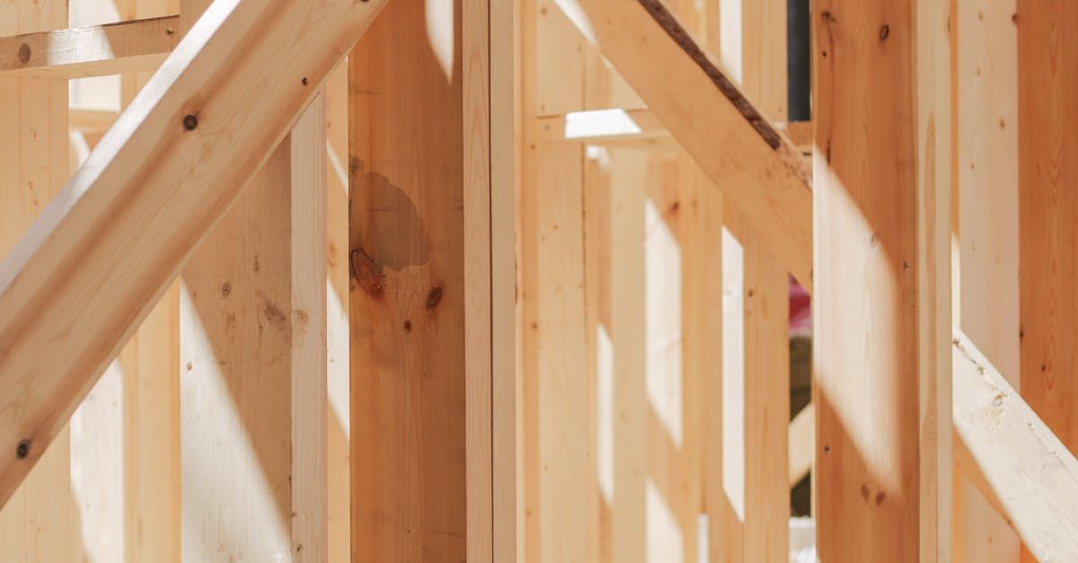 A close up of a wooden frame of a house under construction.