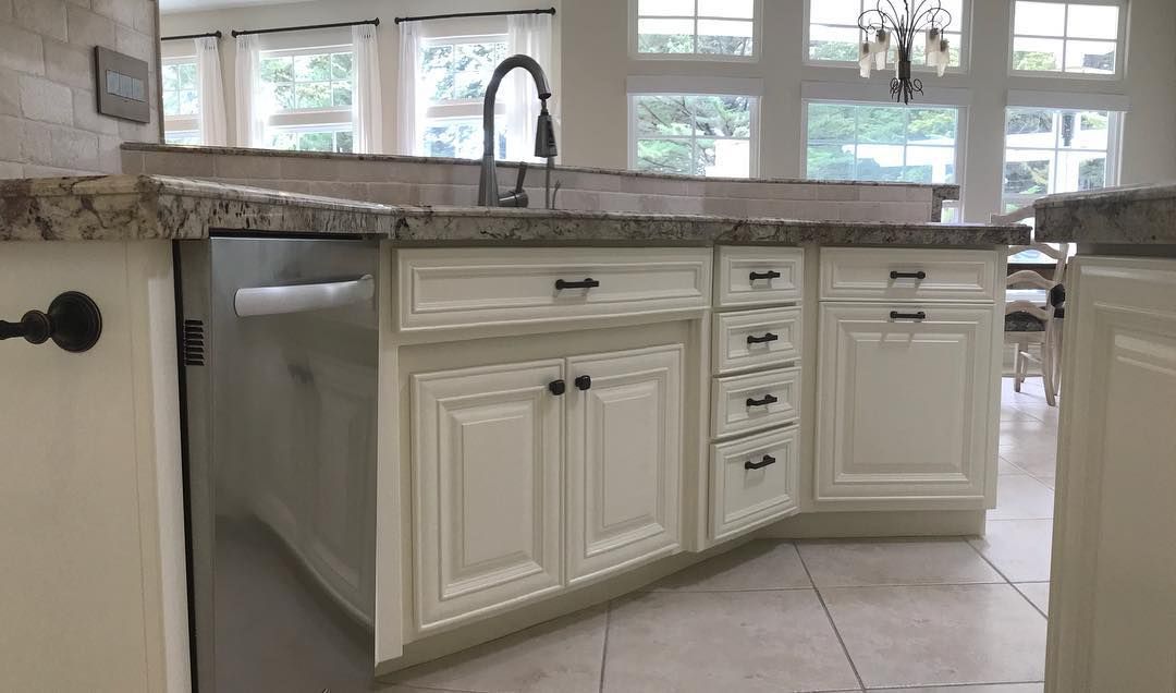 A wooden fence with a gate attached to it.