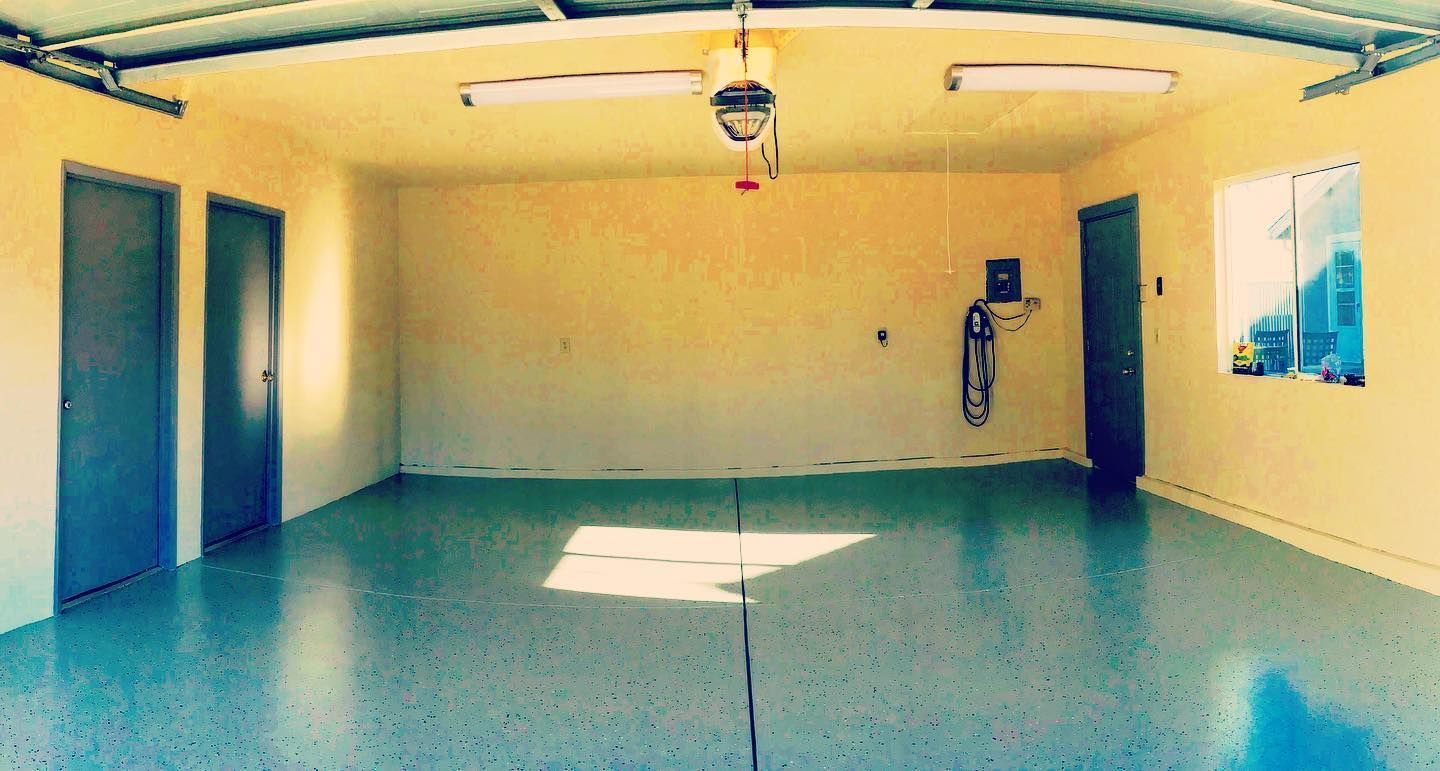 A wooden fence is sitting on top of a lush green field.