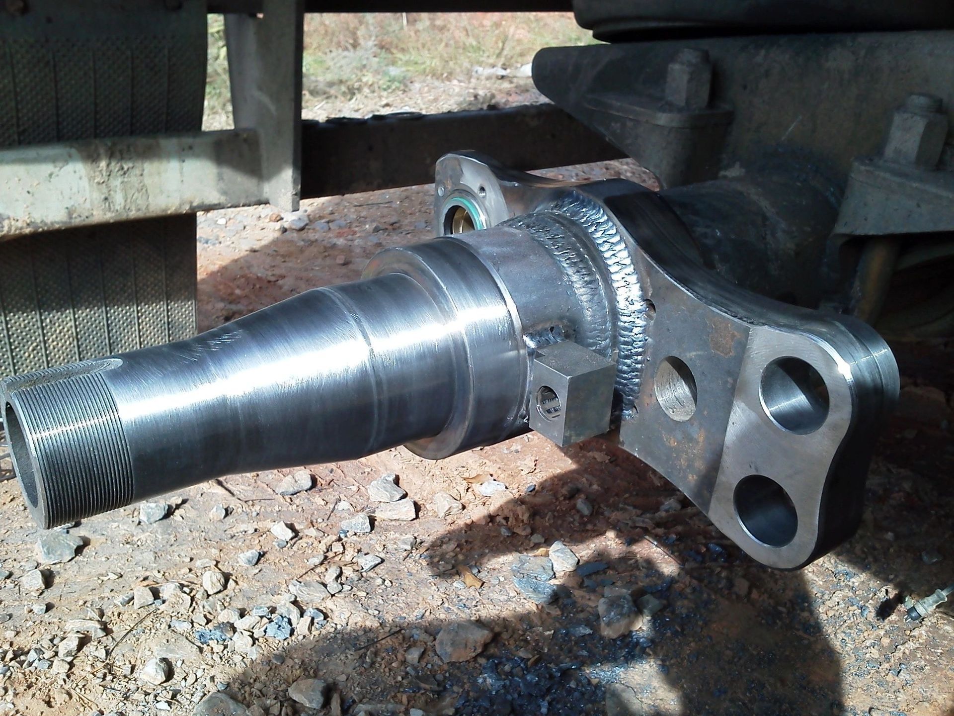 A close up of a metal object with holes in it