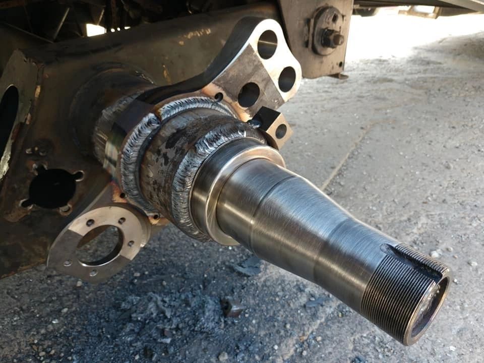 A close up of a metal object with holes in it