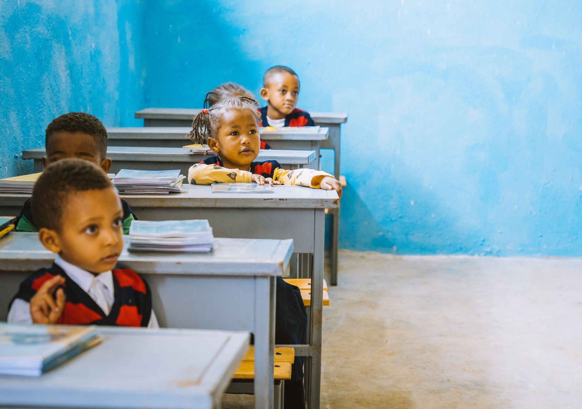 OneLove team serving the members of the community in Ethiopia and meeting the students