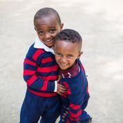 OneLove Ethiopia students smiling. One Love helps provide a safe education to students..