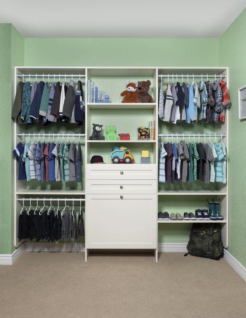 Custom kids closet with white finish