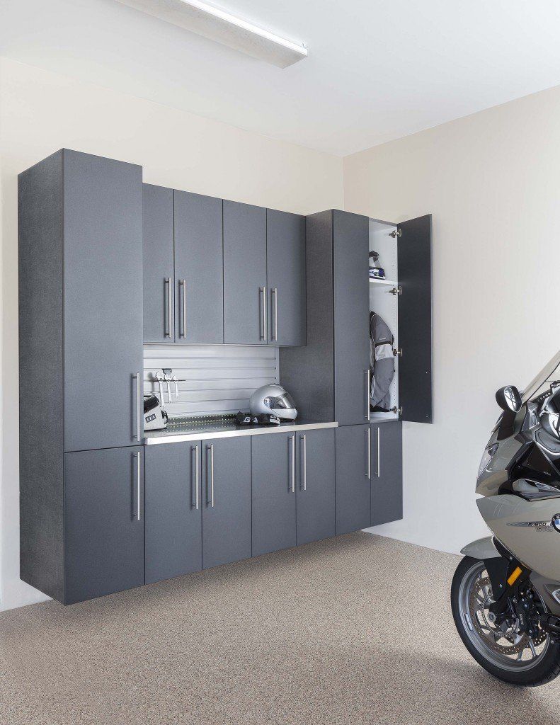 Custom garage storage cabinets with a granite finish