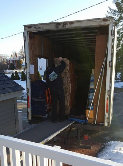 Loading Moving Truck — Truck Unloading Furniture in Manchester, NH