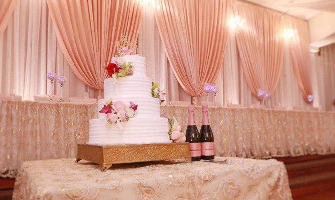 happy garden wedding cake lighting champagne uplighting