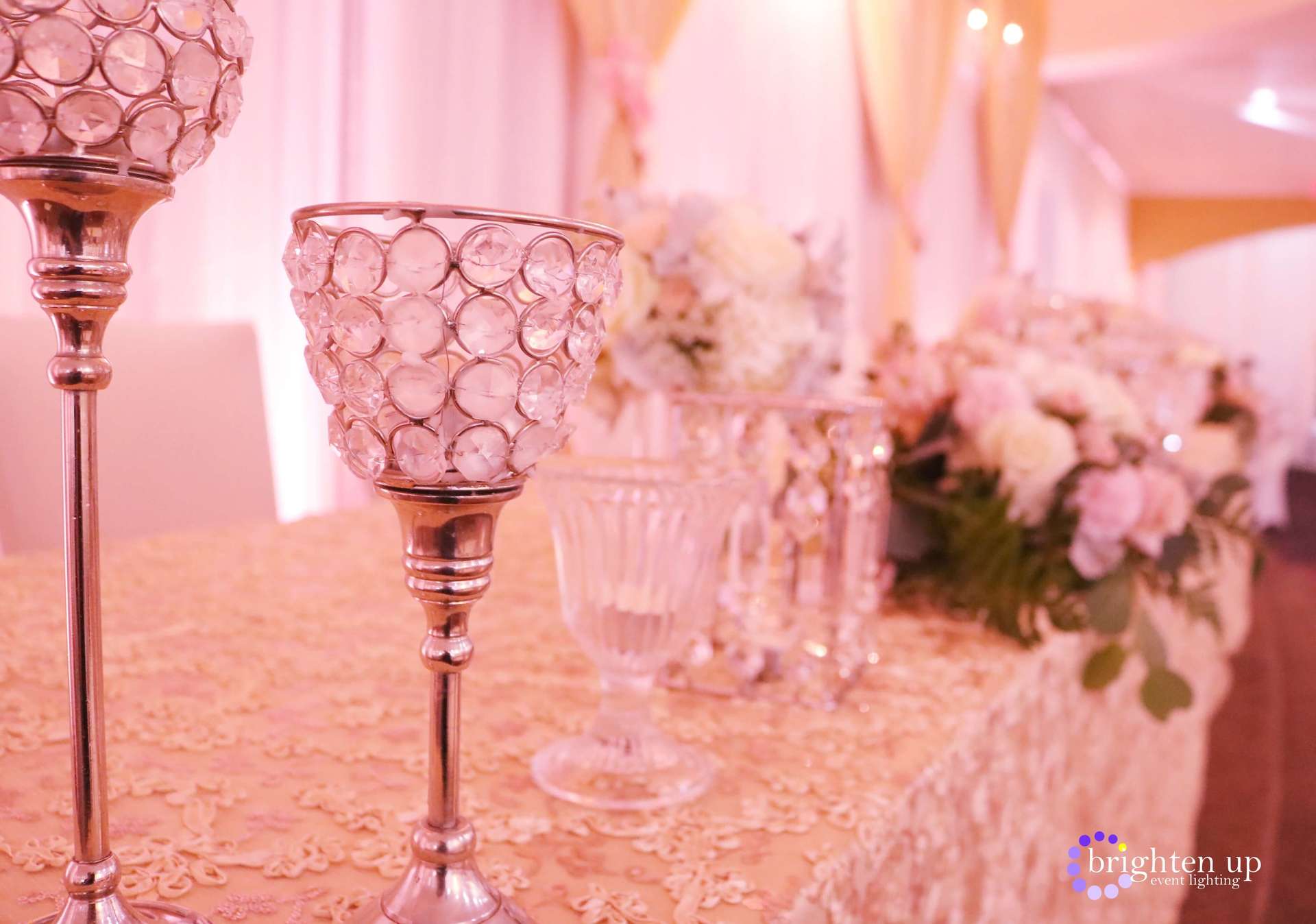 A couple of candle holders sitting on top of a table.