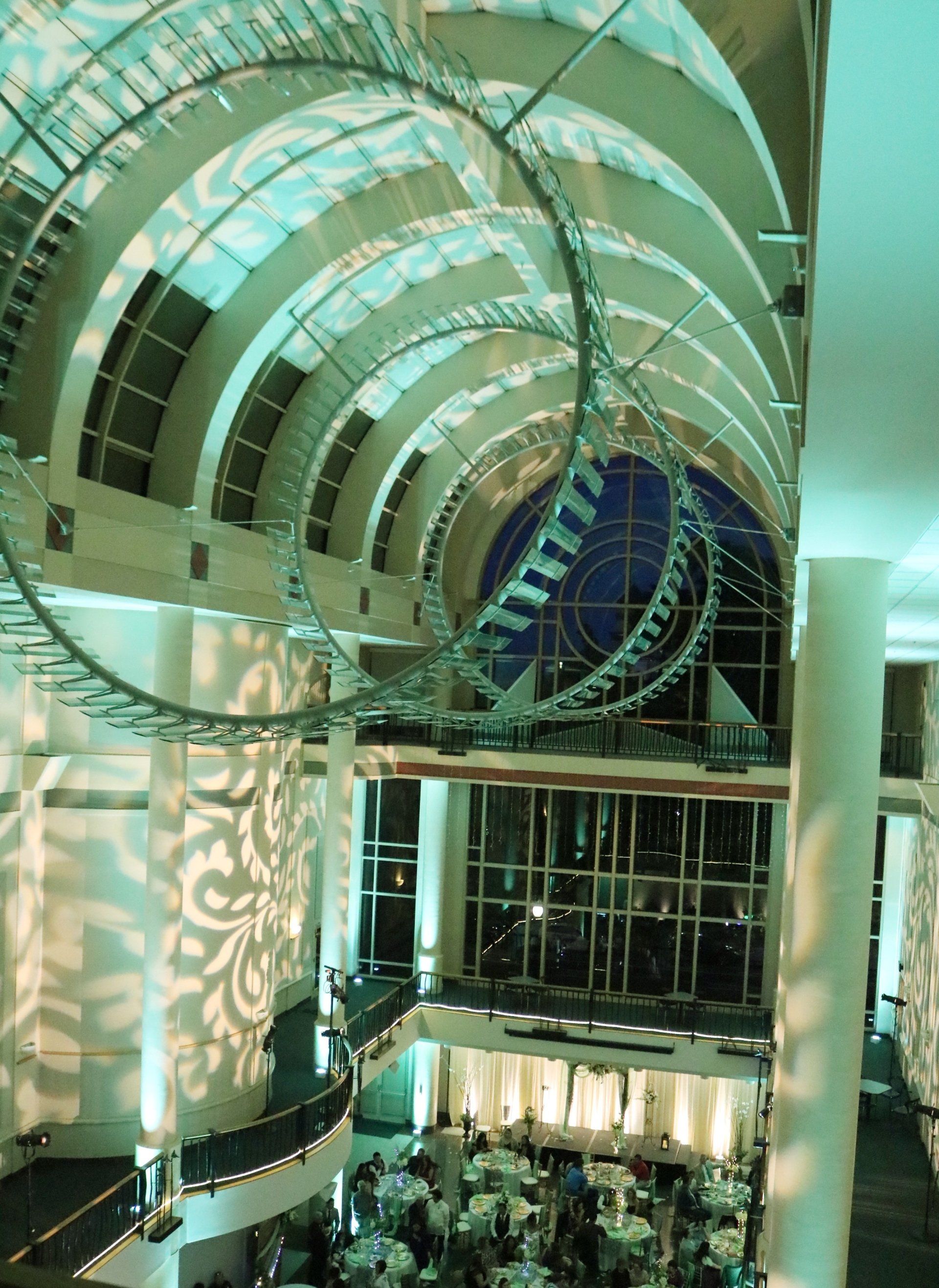 A large building with a lot of windows and tables