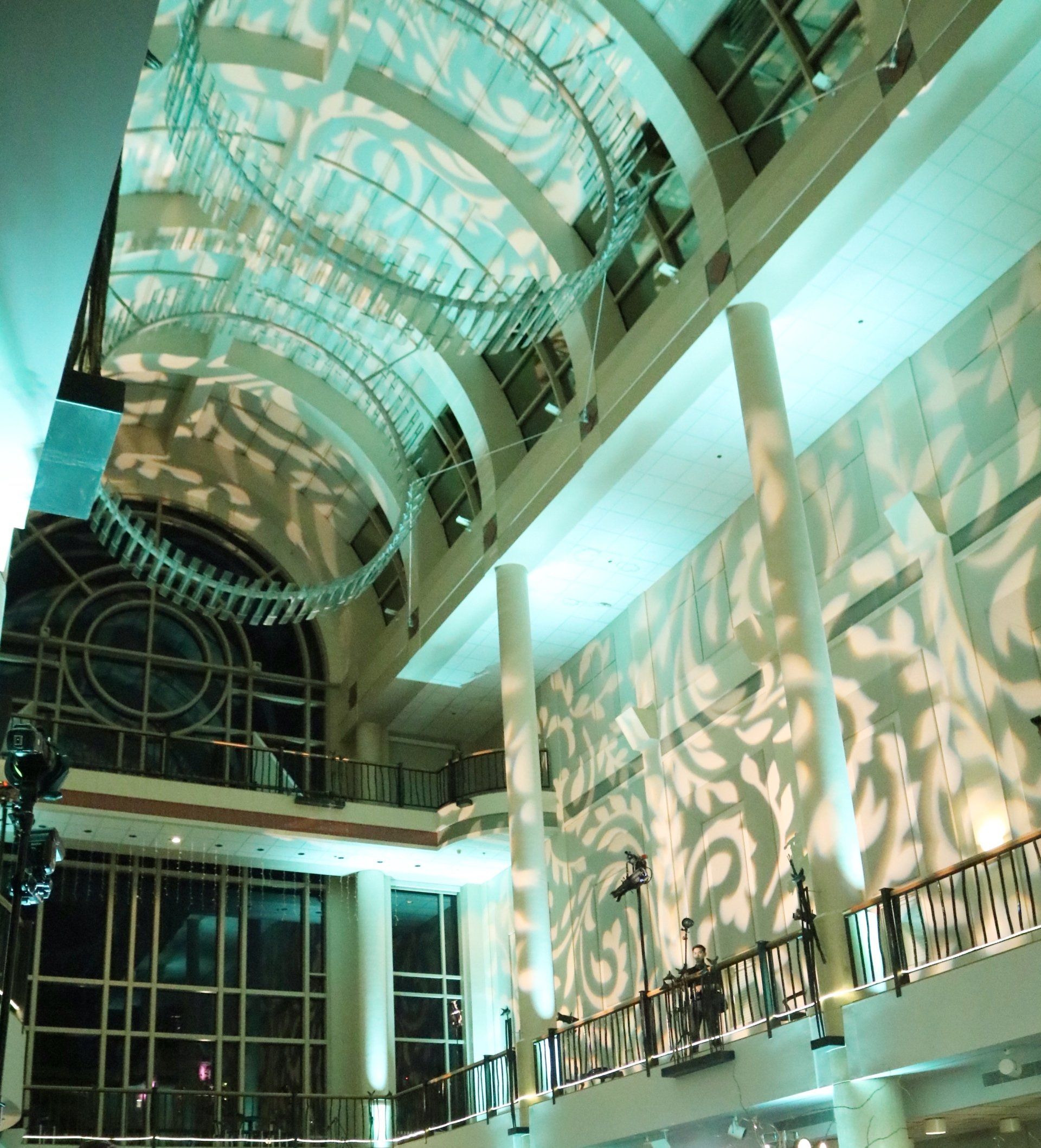A large building with a ceiling that has a pattern on it