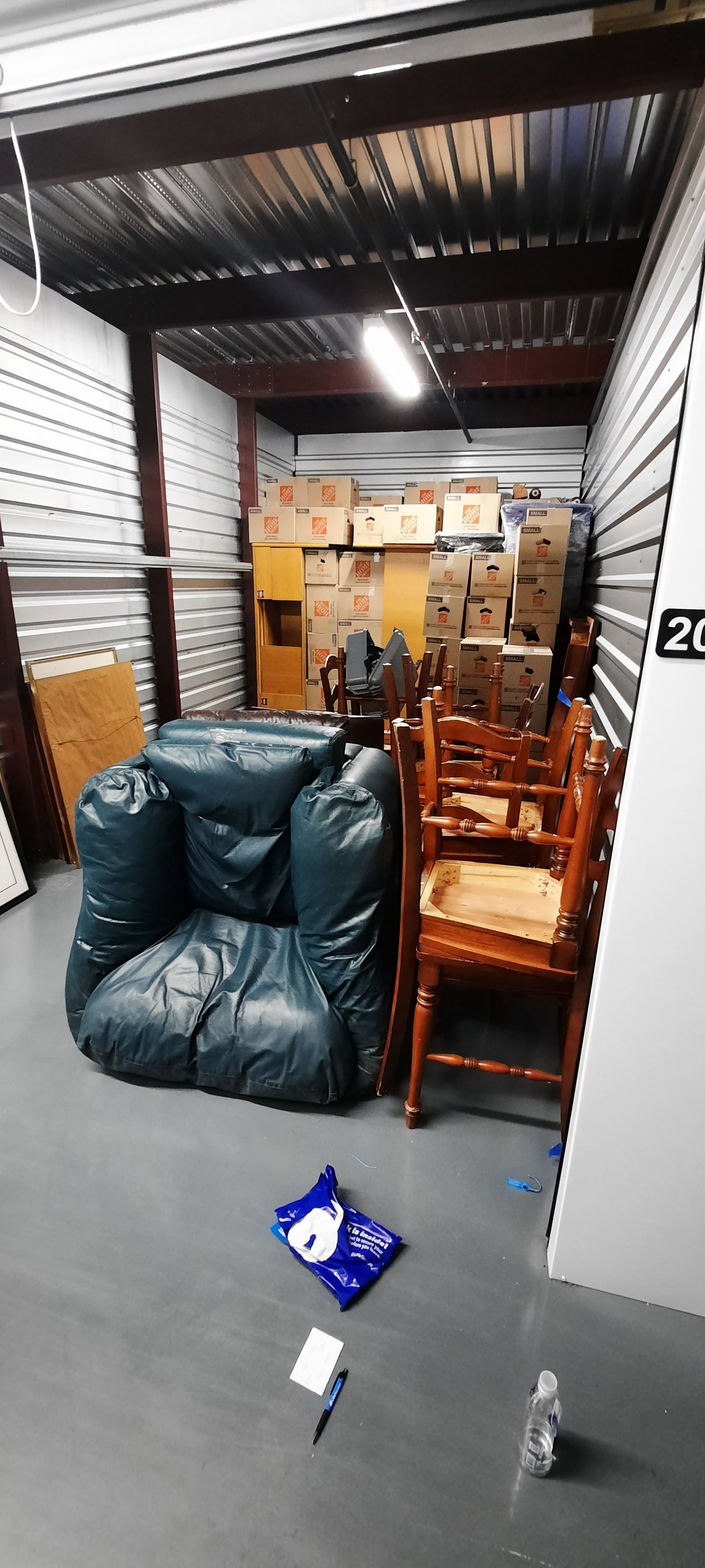 There is a chair and chairs in the room.