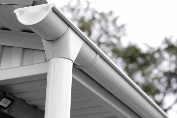 Drainage system of white painted metal
