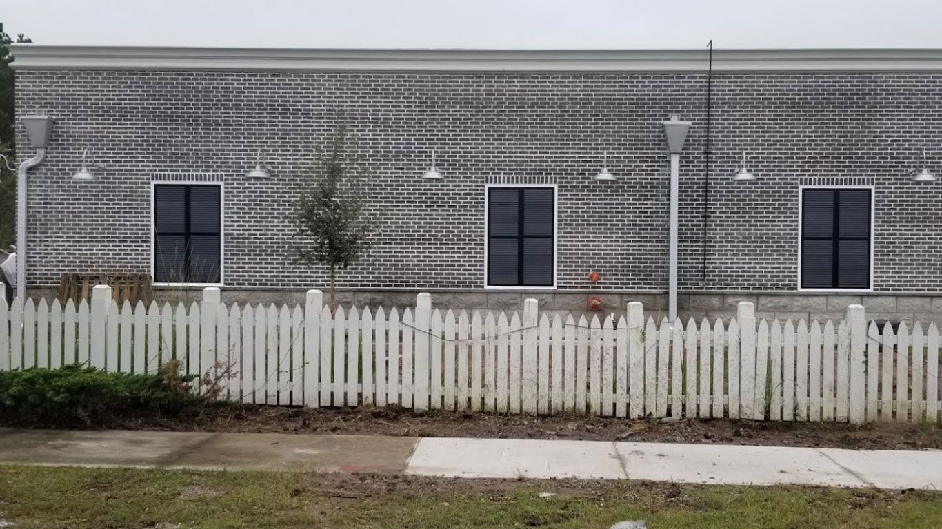 Building with gutter — Savannah, GA — Professional Grade Gutters