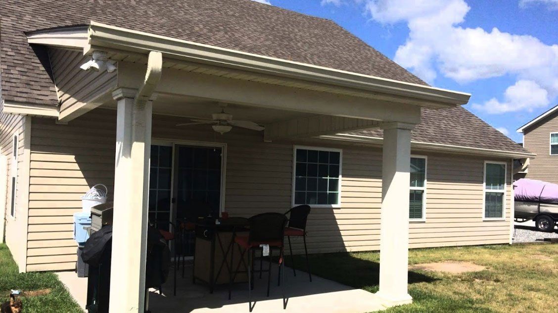 Front view of house with gutter — Savannah, GA — Professional Grade Gutters