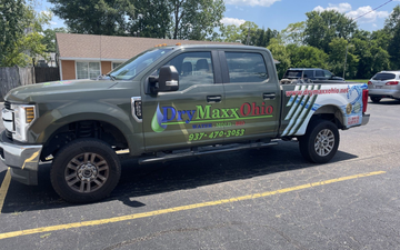 Protection of coronavirus biohazard. Men in respirators and protective suits cleaning public places