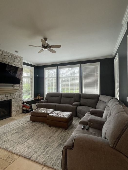 Protection of coronavirus biohazard. Men in respirators and protective suits cleaning public places