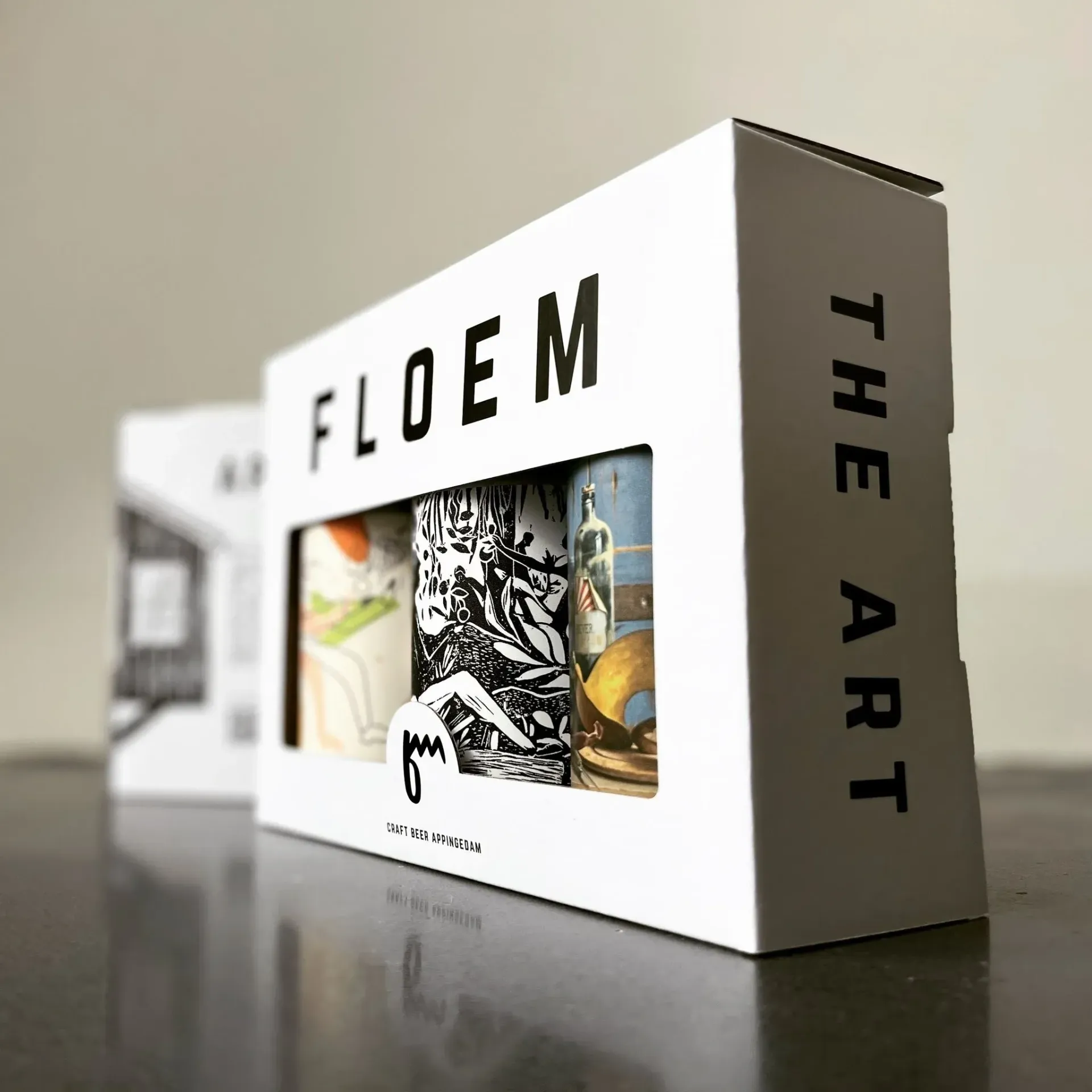 Floem bier pakket The Art met 3 kunstzinnig vormgegeven blikken bier uit Appingedam in strakke witte doos