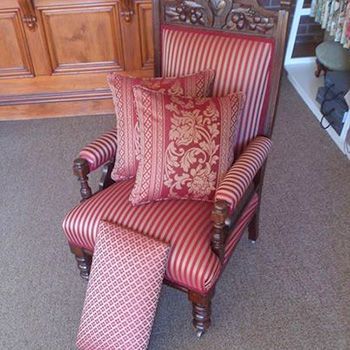 upholstered chair with cushions