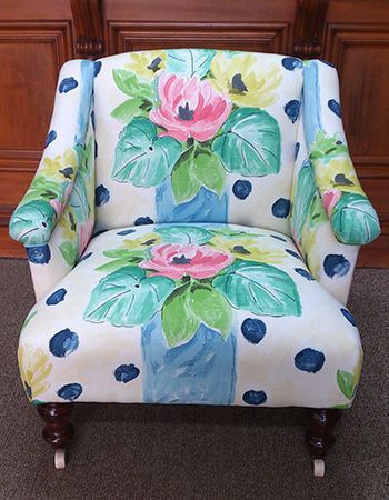 View of a chair with floral print fabric