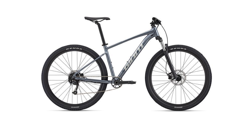 A gray and black mountain bike on a white background.